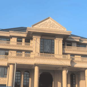 天津黄金麻别墅外墙干挂石材效果示例