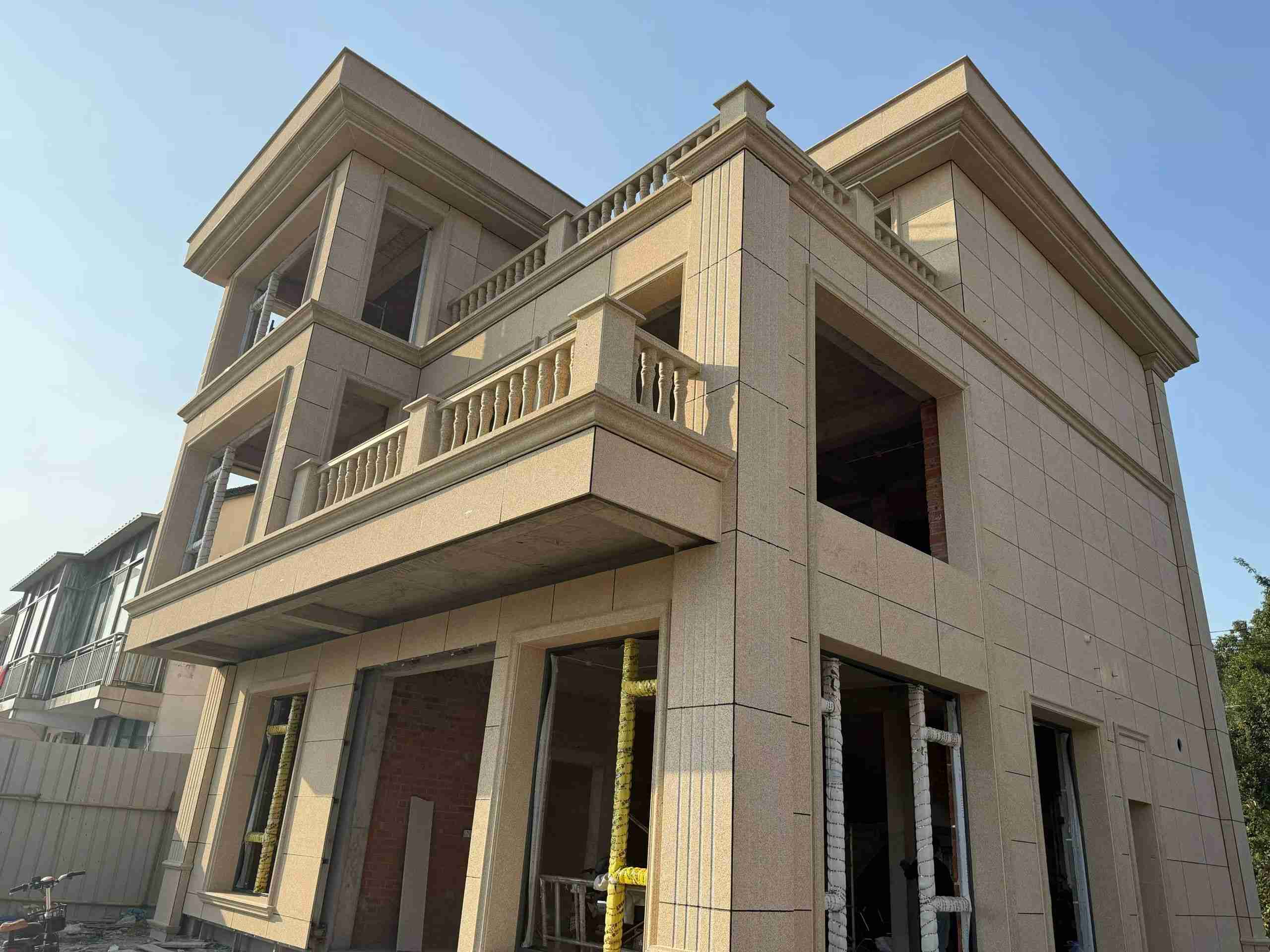 天津 黄金麻花岗岩石材荔枝面外墙干挂效果展示